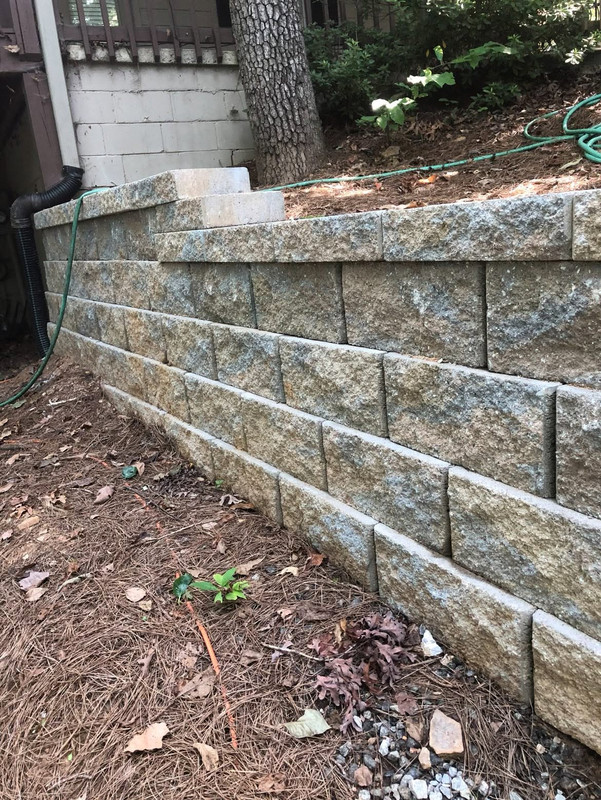 Boulder wall and patio base preparation